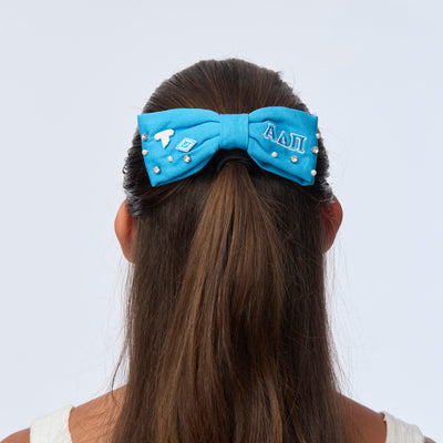 LELE SADOUGHI HAIR AZURE BLUE ALPHA DELTA PI RILEY BOW