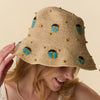Lele Sadoughi HATS TURQUOISE LAPIS SCARAB EMBELLISHED RAFFIA BUCKET HAT