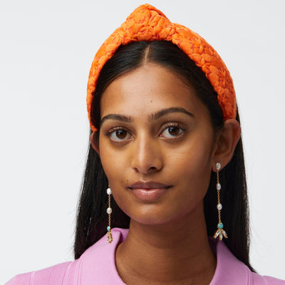 LELE SADOUGHI HEADBAND FIRE KNOTTED FLOWER PATCH HEADBAND