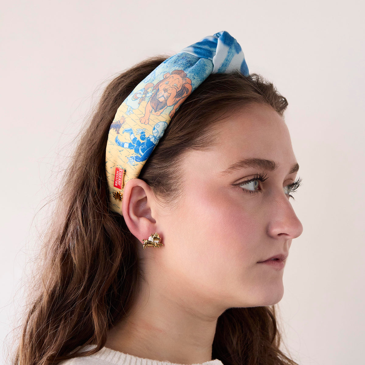 Lele Sadoughi HEADBANDS YELLOW BRICK THE NEW WIZARD OF OZ PRINTED KNOTTED HEADBAND