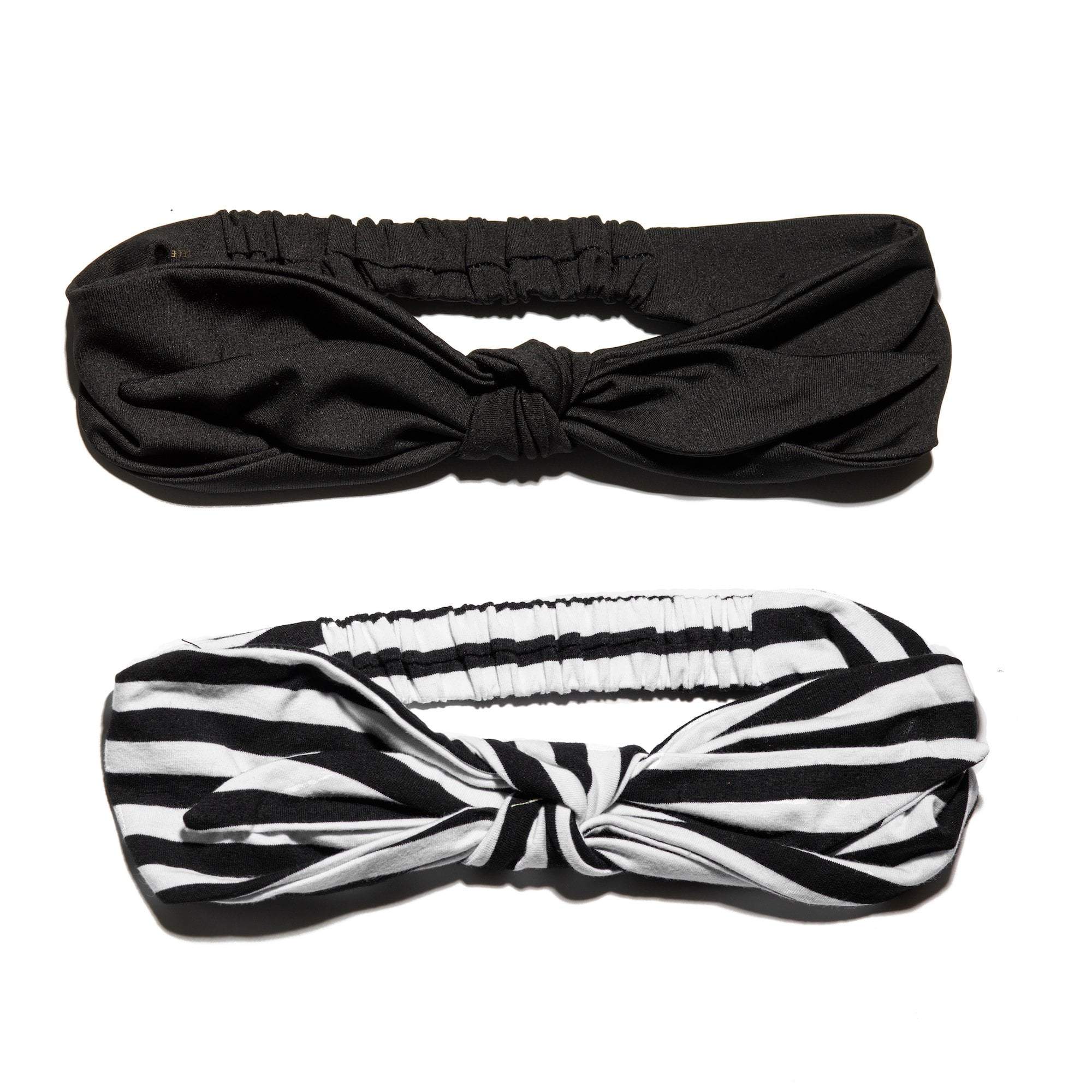 https://www.lelesadoughi.com/cdn/shop/products/lele-sadoughi-headbands-one-size-black-and-white-set-of-2-betty-headbands-19907364749474_2000x.jpg?v=1631903830